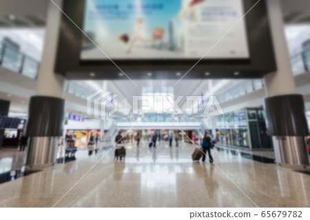 Airport interior. Departure hall. People with Airport interior. Departure hall. People with 65679782