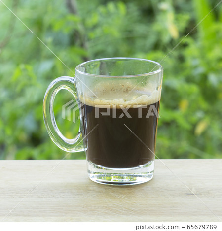 Thai Black Coffee on Wooden Bar Thai Black Coffee on Wooden Bar 65679789