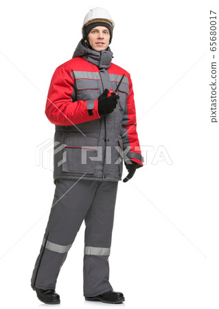 Man in winter workwear and cap isolated view Man in winter workwear and cap isolated view 65680017