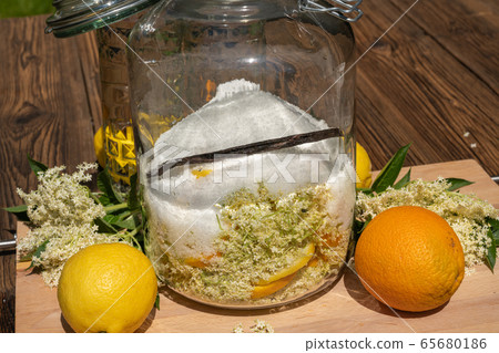 Large preserving jar with the ingredients for 65680186