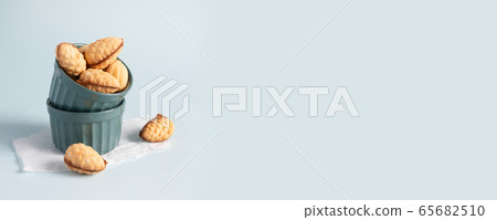 Homemade cookies Nuts in a green porcelain bowl on 65682510