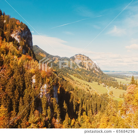 Beautiful nature of European Alps, landscape view of alpine mountains, lake and village in autumn season, travel and destination Beautiful nature of European Alps, landscape view of alpine mountains, lake and village in autumn season, travel and destination 65684256