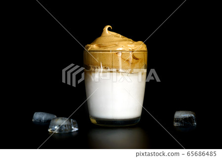 Dolgano wipped creamy coffee with ice on background Background isolated  65686485