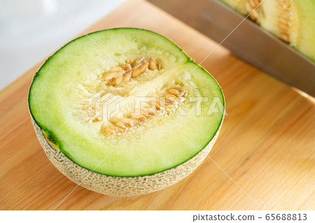 In front of the melon 65688813
