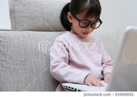 Child (glasses laptop computer parenting childcare copy space infant glasses teleworker home study) 65689092