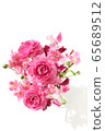 Arrangement of peach, ranunculus and sweet pea (vertical) 65689512