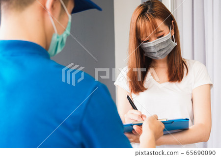 delivery man courier in uniform protective face delivery man courier in uniform protective face 65690090