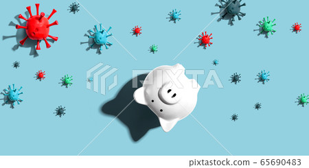 Upside down piggy bank with epidemic influenza and Covid-19 concept Upside down piggy bank with epidemic influenza and Covid-19 concept 65690483