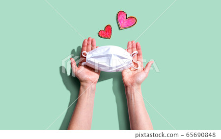 Medical worker appreciation theme with hearts and a mask Medical worker appreciation theme with hearts and a mask 65690848