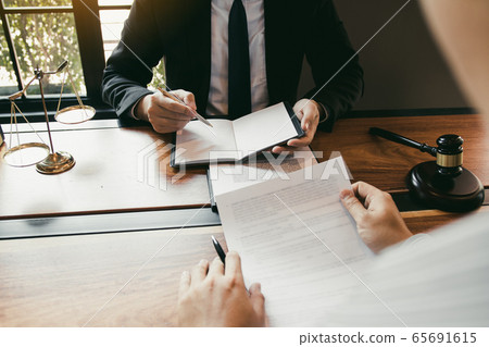 Business lawyer is currently counseling the Business lawyer is currently counseling the 65691615