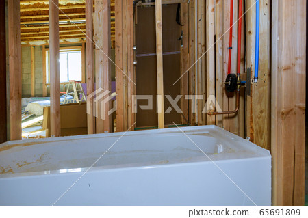 Interior framing of bathroom a new acrylic bathtub Interior framing of bathroom a new acrylic bathtub 65691809