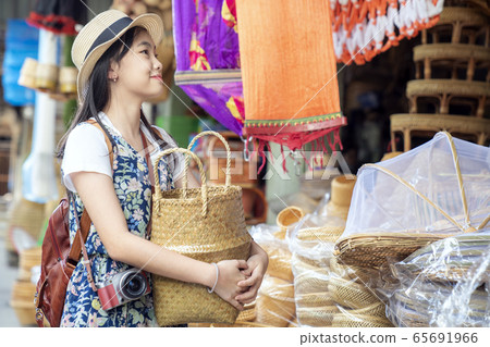 Asian girl, travel and shopping in traditional 65691966