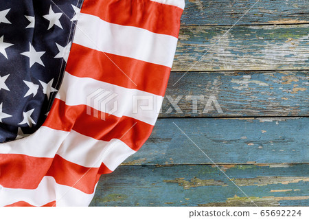 American flag on old wooden board independence day American flag on old wooden board independence day 65692224