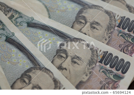Ichiman yen bills (multiple images) Ichiman yen bills (multiple images) 65694124