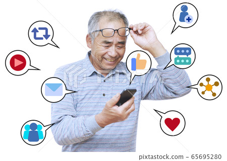 Men enjoying SNS on mobile phones 65695280