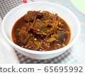 Hunglae pork curry in white bowl 65695992