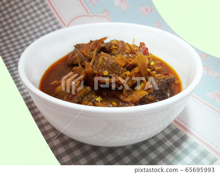 Hunglae pork curry in white bowl Hunglae pork curry in white bowl 65695993