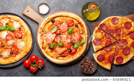 Various tasty homemade pizza Various tasty homemade pizza 65696921