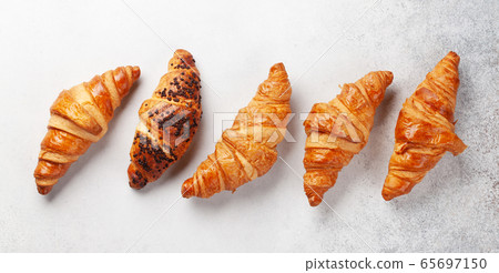 Fresh tasty croissants 65697150