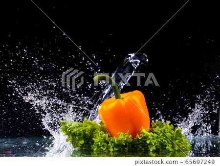 fresh water splash on red sweet pepper 65697249