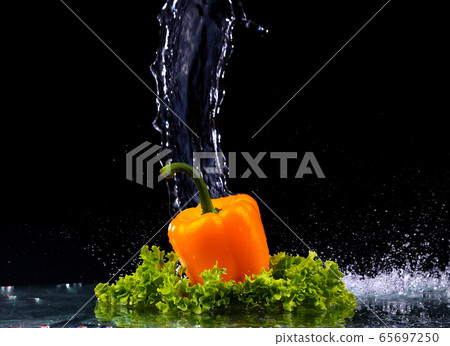 fresh water splash on red sweet pepper fresh water splash on red sweet pepper 65697250