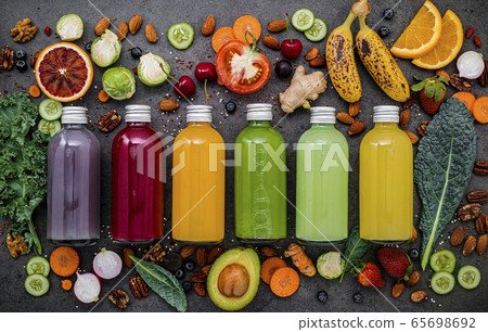 Colourful healthy smoothies and juices. Colourful healthy smoothies and juices. 65698692