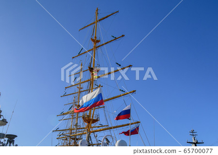 Flags of Russia on masts of sailing ship. 65700077