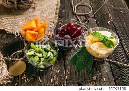 Healhy organic vitamins food chopped fruits Healhy organic vitamins food chopped fruits 65703168