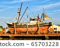 Fishing boat in a shipyard in Buesum on the North Sea in Germany 65703228