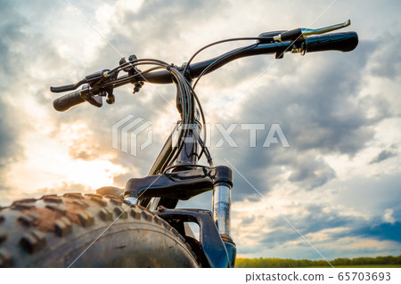 A Bicycle with thick wheels  65703693