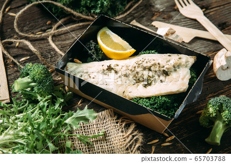 healhy organic lunch white fish fillet with lemon 65703788