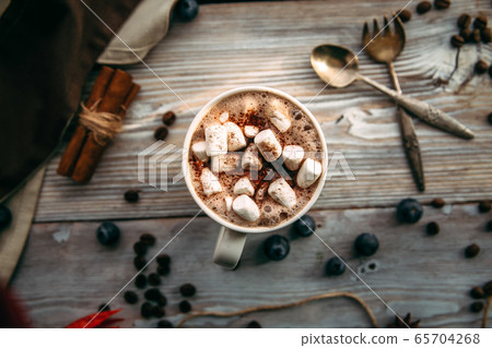 Appetizing sweet coffee with marshmallows  65704268