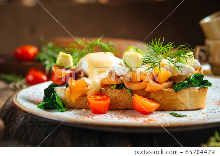 Bruschetta with salmon cheese and vegetables Bruschetta with salmon cheese and vegetables 65704479