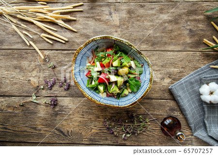 Healthy fresh salad with vegetables in a bowl 65707257