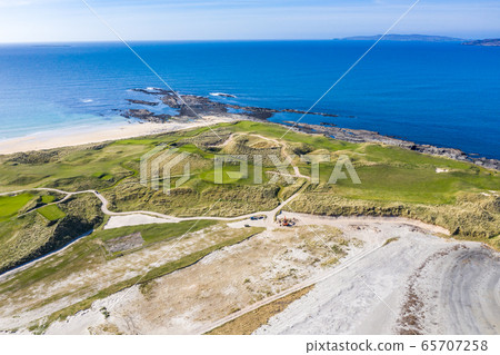 Aerial view of Carrickfad and Cashelgolan beach, Castlegoland, by Portnoo in County Donegal - Ireland Aerial view of Carrickfad and Cashelgolan beach, Castlegoland, by Portnoo in County Donegal - Ireland 65707258