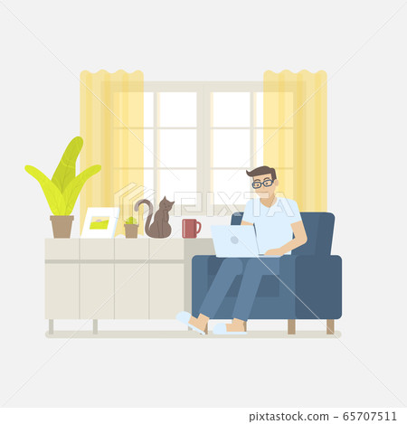 Man working at home on armchair 65707511
