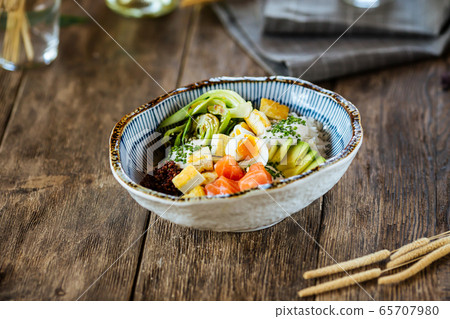 Poke bowl rice vegetables salmon end quail eggs 65707980