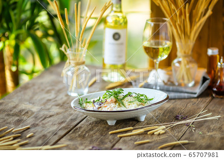 Gourmet seafood white salad with octopus shrimps  65707981