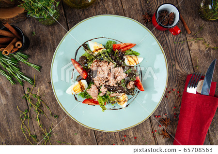 Gourmet tuna salad with eggs greens and sauce Gourmet tuna salad with eggs greens and sauce 65708563