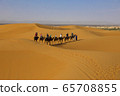A caravan of camels. Desert in Morocco. 65708855