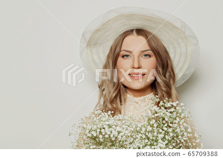 Happy woman in summer hat, beautiful female face Happy woman in summer hat, beautiful female face 65709388
