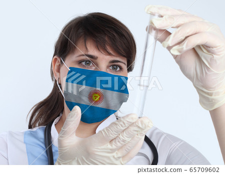 Scientist woman and mask with Argentina flag. Scientist woman and mask with Argentina flag. 65709602