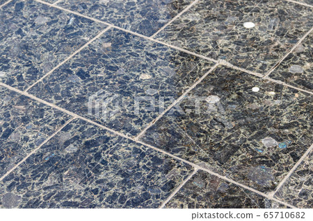 Background of gray granite paving slab. Background of gray granite paving slab. 65710682