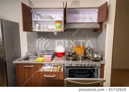Modern kitchen with utensils and everything 65710928