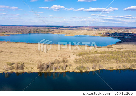 View from the drone of the Uvodsky reservoir on a View from the drone of the Uvodsky reservoir on a 65711260