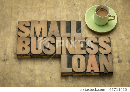 small business loan word abstract in wood type 65711430