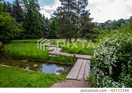 Cascade of small  wooden bridges in Moscow 65711594