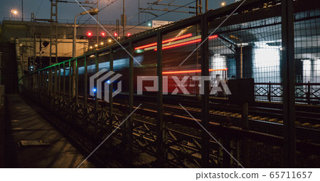 lights of the past train behind the trellis at night lights of the past train behind the trellis at night 65711657