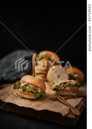 Tuna mini burger on table . 65714943