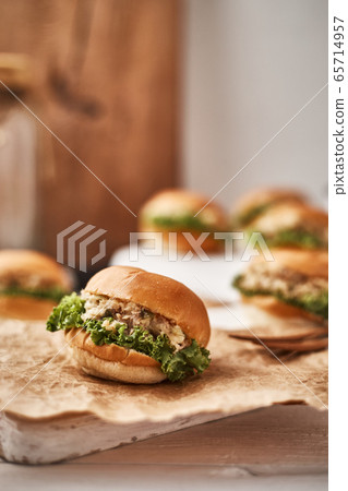 Tuna mini burger on table . 65714957